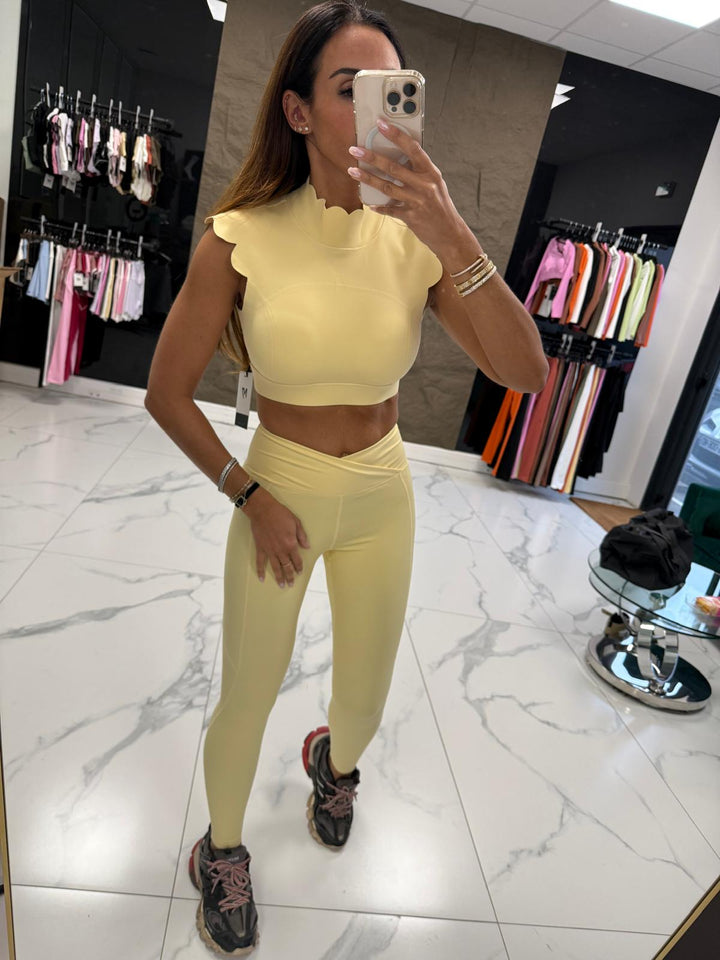 WAVY COL MONTANT OPEN BACK SHOULDERS